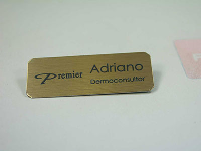Crachá de aço inox